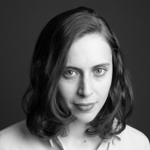 Black and white headshot of Ava Kofman